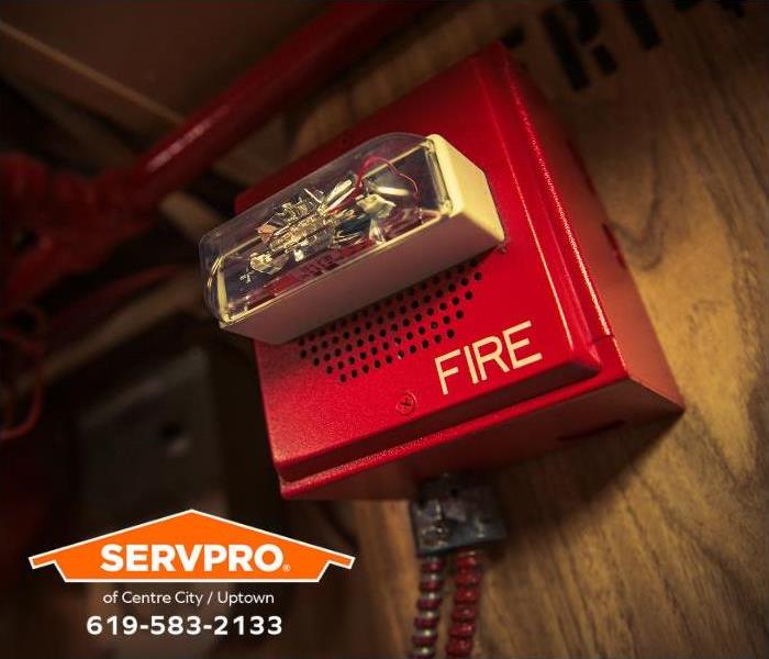 A fire alarm is fitted with a strobe light to alert deaf and hard-of-hearing people.
