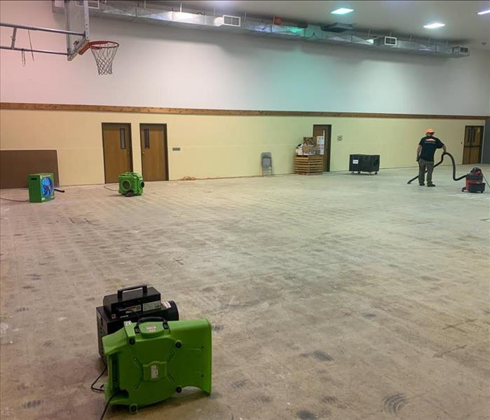 Drying equipment setup to cleanup water damage in San Diego gymnasium