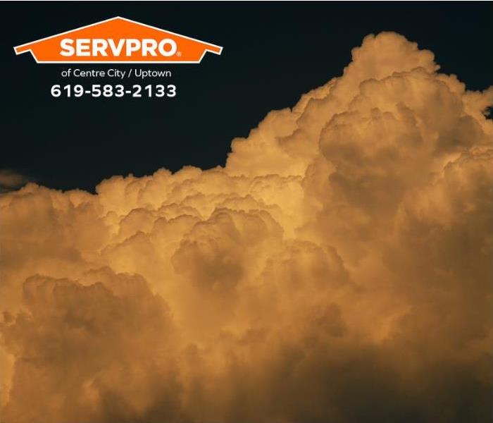 Cumulonimbus clouds fill the sky before unleashing a thunderstorm.